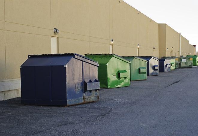 dumpsters with safety cones in a construction area in Bearsville, NY